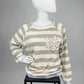 Gestreifter Pullover mit Paillettenblume, Gr. 36-42