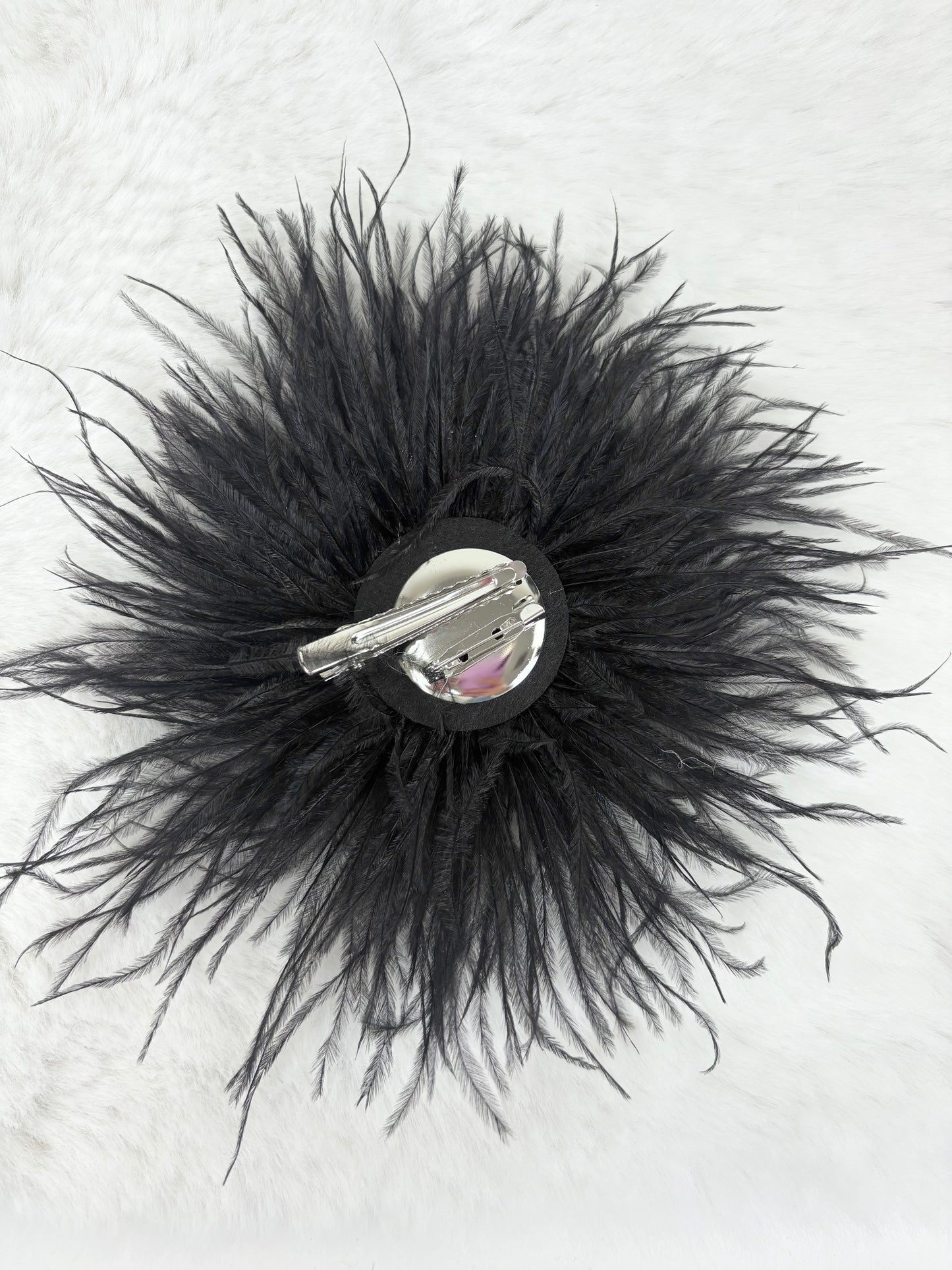 Feder-Brosche schwarz
