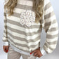 Gestreifter Pullover mit Paillettenblume, Gr. 36-42