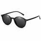 Rund Sonnenbrille, Dunkles Gestell mit dunklen Gläsern